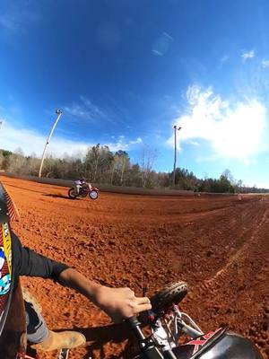 A post by @t_huntleyy on TikTok caption: Some good grudge racing w my dawg @Tay 🔥🔥🔥 #dirtracing #dirtracingforlife #bikelife #ktm450 #trx450r #fyp #gopromax #ktm #hondatrx #clutchhand