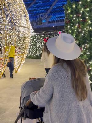 A post by @jenniferhenrynovich on TikTok caption: Making new holiday memories at ENCHANT Christmas light maze & village presented by @hallmarkchannel   ✨🎄#enchantchristmas #hallmarkchannel