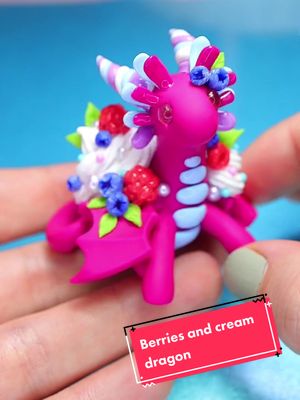 A post by @hopienoellecharms on TikTok caption: Berries and cream dragon :D #clayart #polymerclay #claydragon #artist #claytok #berriesandcream