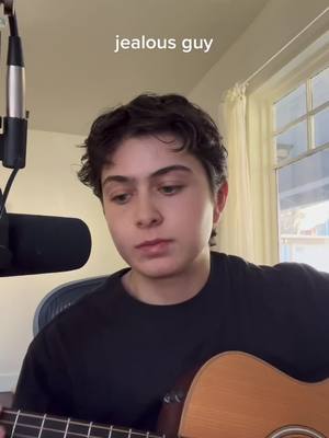 A post by @boychikpea on TikTok caption: challenging myself to sing harder songs as i relearn. this one was fun :) #cover #johnlennon #queer 