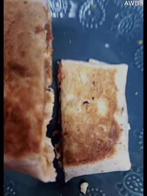 A post by @vemeking on TikTok caption: #breakfast #crunchwrap #food #Foodie #cheese #bacon #sausage #hashbrown #tortilla #tacosauce #good #ohyeah #reels #fyp 