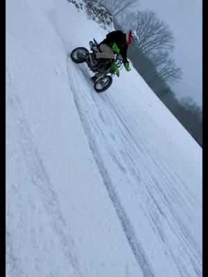 A post by @ab_3399 on TikTok caption: Waiting on that snow and ice❄️🥶 #pitbike #klx110l #kawsaki #michigan #throwback #HolidayOREOke #fyp 