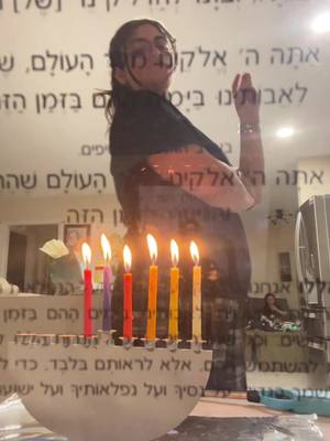 A post by @itsreallyroni on TikTok caption: happy hanukkah … he did make graduation though