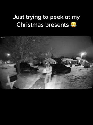 A post by @bhessxoxo on TikTok caption: He thinks I’m trying to peek at my presents 😆 #christmas #christmaspresents #ringcameras #wv #westvirginia 