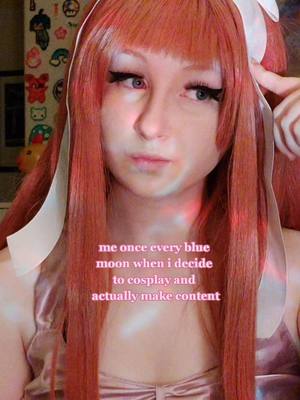 A post by @honeycosplayy.s on TikTok caption: i havent cosplayed for months, i just keep digging out drafts 😭 // #monika #ddlc #lgbtq #dokidokiliteratureclub 