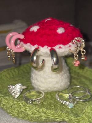 A post by @nicolecowlwellx on TikTok caption: first attempt at mushroom jewellery holder 🥰 #fyp #crochet #mushroom #crochetmushroom #jewelleryholder