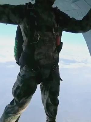 A post by @user349122661394 on TikTok caption: Skydiving, the most handsome military salute! This is too handsome#Parachuting #Extreme Sports