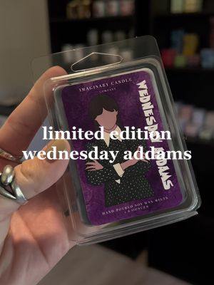 A post by @imaginarycandles on TikTok caption: launching 1/2/2023 !!! 💜🖤🌂 #wednesday #wednesdayaddams #wednesdayedit #waxmelts #wednesdaydance 