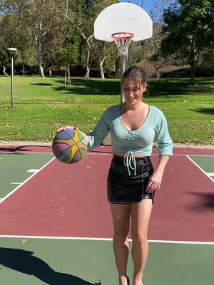 A post by @kaylaautumnward on TikTok caption: Walking bucket #trickshot #basketball #ballislife #shecandoboth #hoops #heels 