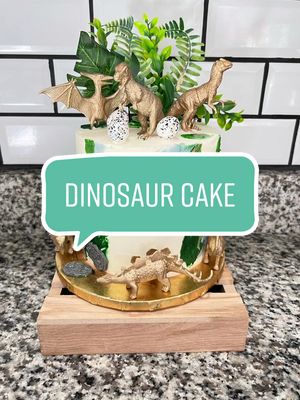 A post by @craftybakerbyarabel on TikTok caption: Dinosaur cake fill with strawberries and  dulces de leche . ##dominicancake##dinosaur##dinosaurscake##dinosaurscake🦖🦕##forestcake##hiscake##hercake##fyp##sanfordfl##lakemary##birthday