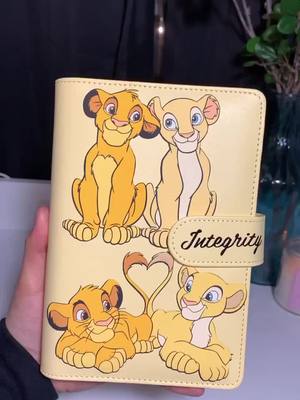 A post by @khayteeco on TikTok caption: Start the year right with a budget binder🤍 #budgetbinder #cashenvelopes #cashenvelopesystem #disneyinspired #khayteeco 