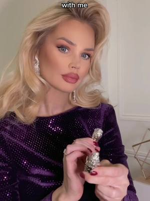 A post by @rachelward_e on TikTok caption: Winter Party Glam with @trillion.london Cheetah Bangle, Acrylic clutch & Silk scarf #makeastatement #ilovetrillion #trillionlondon  AD