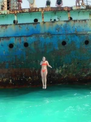 A post by @sambozsteez on TikTok caption: thought i was going to fall through this rusty ship before we even got to jump off 😂 so sick #shipwreck #CapCut #turksandcaicos #travel #Love 