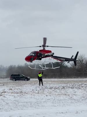 A post by @alanstack on TikTok caption: Flying the dream catcher in the great white north!! #helicopter #usa #winter #illinois 