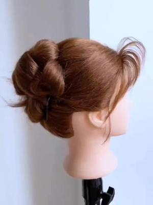 A post by @fairy008615057936909 on TikTok caption: #partyhair #hairaccessories #dailyhairstyles #easyhair #hairstyle #hairsdiy #hairbraid #updo #hairbun@tiktok