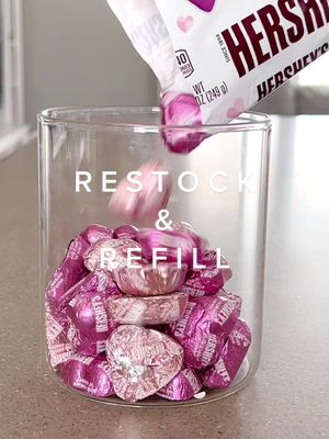 A post by @offbeat_momma on TikTok caption: I am currently battling an ear infection 😩. Chewing on chocolate may not help the pain, but it sure as heck will help my soul 🤣😆.  Here is a quick restock of the Valentine’s Day candy I’ll be nibbling on all day! 🍫  #restock #restockasmr #restockandrefill #satisfying #fyp #foryoupage #restockoclock #restockday #momlife #asmr #candyrestock #chocolate #chocolatecandy 