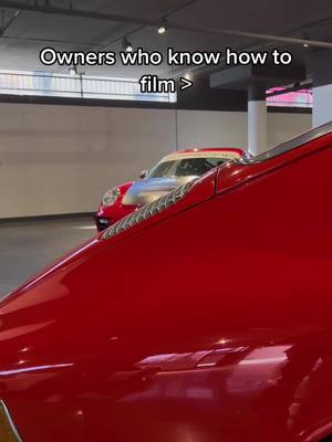 A post by @thegreenbergcollection on TikTok caption: My gt2 in the Santa Clarita dealership #porsche #porschegt2rs #pikespeak #championship #red #car #carsoftiktok #cars #carhub #owners #film #record 