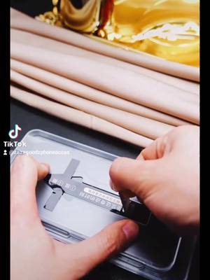 A post by @zazagoodzphoneacces on TikTok caption: Satisfying install screen protector for my iPhone #screenprotector #Factory #foryou #fyp #phoneaccessories #asmr #satisfying