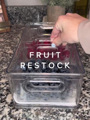 A post by @life.with.em__ on TikTok caption: Fruit restock🤩 #restock #asmr #restockasmr #restocking #kitchen #fridgeorganization #fridgerestock #kitchenrestock 