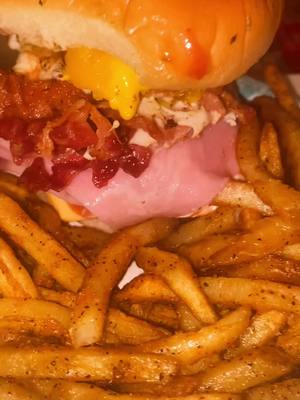 A post by @mizjenny956 on TikTok caption: Lunch! Double cheese burger with egg ham and cheese 😍 #cheeseburger