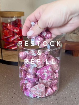 A post by @offbeat_momma on TikTok caption: Happy Valentine’s Day!! 💖 Here is a quick little v-day candy restock for you all 🥰 #restock #asmr #restockasmr #restockandrefill #satisfying #fyp #foryoupage #momlife #ValentinesDay #candyrestock #happyvalentinesday 