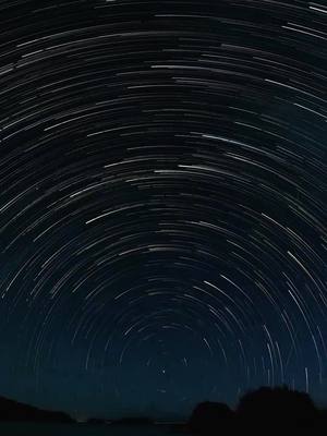 A post by @agrimisadventures on TikTok caption: Who knew you could do this with a GoPro? Make sure you set your ISO min and max to 800, set shutter to auto, plug in an external battery to triple the battery life needed for 6+hrs of continuous shooting and set the star trail length to “long.” #gopro #startrails #setupvstheshot #adventuretravel @gopro 