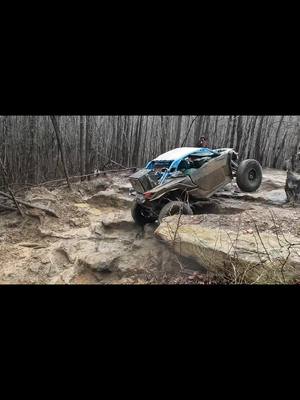 A post by @gbowen1 on TikTok caption: Windrock was sloppy! Airplane hill trail 39. #canam #windrock #windrockoffroadpark #airplanehill #trail39 #zillas 