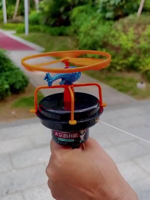 A post by @functiontoy on TikTok caption: #toy#mini#flyingtoy#parachute