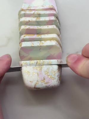 A post by @speckledsienna on TikTok caption: Spring Pastel Marble #handmade #clayearrings #howitsmade #fyp #artistcheck #spring 