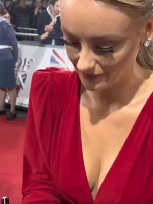 A post by @uktvwomen on TikTok caption: Katie Mcglynn #foryou #foryoupage #fypシ #fy #sexy #hot #tiktok #tik #tok #trend #trending #explorepage #explore #actress #uk #british #unitedkingdom #dress #red #reddress #redcarpet #katie #katiemcglynn 