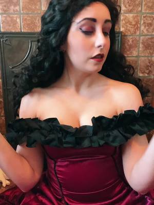 A post by @dolleyescosplay on TikTok caption: Much too intellectual. #ballgown #oc #curlyhair #princess #toointellectual #racketball 