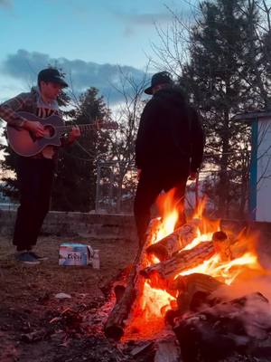 A post by @lovewarmusic on TikTok caption: Spring fires, some writin, some livin, some singin @Eddie Mac  #fyp #artistsoftiktok #independent #brothers 