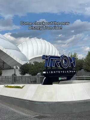 A post by @mystthemom on TikTok caption: Last week at the Passholder preview for Tron! @zylarthedad @nefarious_neo @shadowkeen #tron #waltdisneyworld #magickingdom #magickindomdisney #annualpassholder 