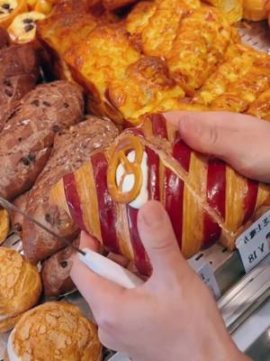 A post by @johnhogan894 on TikTok caption: Croissant bread#bread #breadmaking #breadscoring #breadwinner #delicious