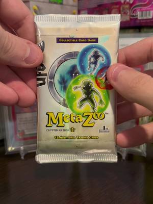 A post by @zoracscollects on TikTok caption: MetaZoo - UFO 21 #Shorts 🛸 #metazoo #metazoogames #metazootcg #metazoocommunity #metazoocollector #metazoocollection #metazoopull #fypシ #tcg 