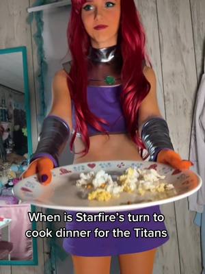 A post by @wickedwaifu on TikTok caption: Bone apple the teeth 🥰 #starfire #starfirecosplay #teentitans #beastboy #titans 