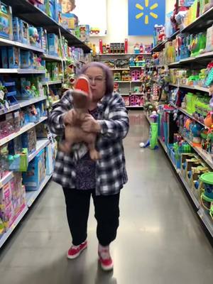 A post by @itsgramasandyhere on TikTok caption: 🦖 RAWR #grandma #crazy #walmart #scary #recordmechallenge #fyp #fypage #fypシ゚viral 