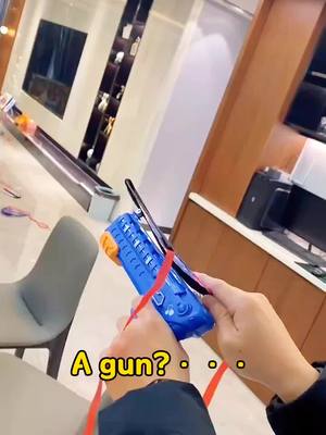 A post by @ztxiaoao on TikTok caption: A gun?!!!Or a kite?… #tiktok #foryou #toy #novelty #decompression 