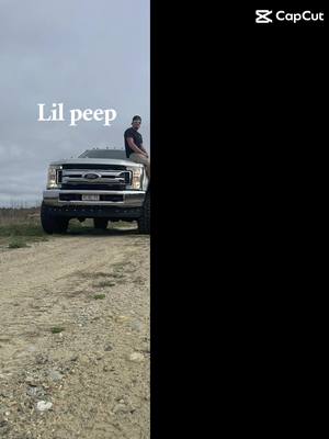 A post by @cjlapworth on TikTok caption: Chilling on a back road #bluecollarboys #ford #lilpeep #trucksoftiktok #stancenation #zyxcba 