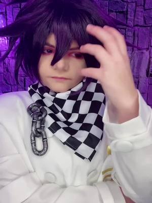 A post by @kaidoggo on TikTok caption: Shuichi duets? 👀 in the middle of a big move rn but then going to work on new cosplays! Heres a hint at my next one: ⛓️🪚🧍🏼 #danganronpa #danganronpacosplay #cosplay #danganronpav3 #kokichiouma #kokichioumacosplay #shuichisaihara #shuichiduets