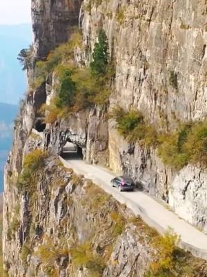 A post by @lvancv on TikTok caption: Wall hanging highway in Shanxi, China.#scenery #beautiful #views #highway #foryou #fyp #amazing