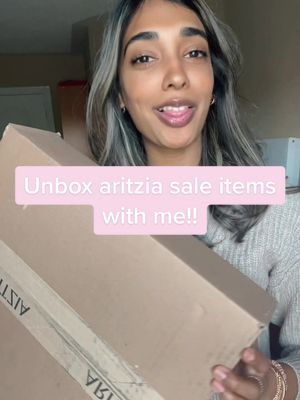 A post by @rafiah.ali on TikTok caption: #fashion #hotgirlsummer #summerlooks #haul #unboxing #capsulewardrobe #aritzia #aritziahaul #aritziaoutfits @Aritzia