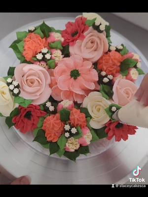 A post by @staceycakesca on TikTok caption: A beautiful cupcake tutorial! #cupcakebouquet #buttercreamflowers #buttercreamflowercupcake #howtopipeflowers #cupcakebouquetpackaging #packagingcupcakes #pipedflowercupcakes 