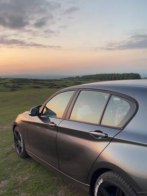 A post by @fin_sheppard_ on TikTok caption: 🌅#bmw #happiness #sunset #fypシ 