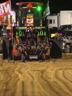 A post by @korporalpunishment on TikTok caption: Pulled off our first light modified win last night in Benson, NC 😎🏁 #tractors #tractorpulling #ntpa #horsepower #motorsports #fullpull #fyp #foryoupage #engine #dirt 