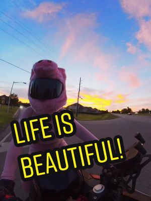 A post by @aphyliciousv on TikTok caption: Sunsets like this 😍 the sky matches my @MotoLoot helmet cover 🥰 #TransformersVoices #foryou #motorcycle #fyp #kawasaki #sunset 