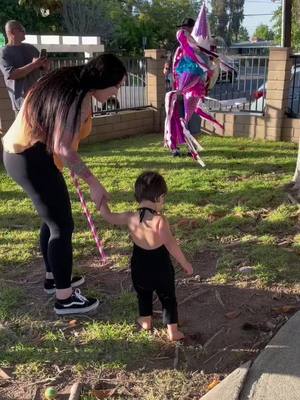 A post by @brooke.davina on TikTok caption: Uncle miguelito helping e her 2nd bday pinata 😭😭 #MomsofTikTok #toddlersoftiktok