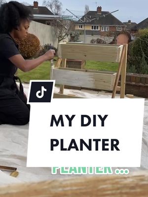 A post by @jessica_grizzle on TikTok caption: I made a PLANTER 🌸✌🏽#diyplanter #planterdiy #gardendiy #gardendiyproject #grizzlegarden 