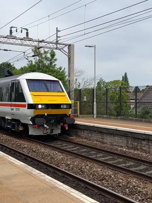 A post by @westcoastelectrics on TikTok caption: Hey Everyone! Heres Locomotive Services Limited’s 82139 & 86101 passing Liverpool South Parkway running a service down to London Euston on behalf of Avanti West Coast, I hope you enjoy! 💙