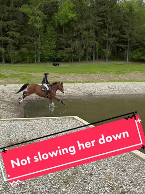 A post by @redraven2021 on TikTok caption: “Or she’ll go through it like a rocket” -the water didnt slow her down at all #eventing #eventer #horselife #practicemakesperfect #fy #fyp #foryou  #equestrian #horsejumping #horsetok